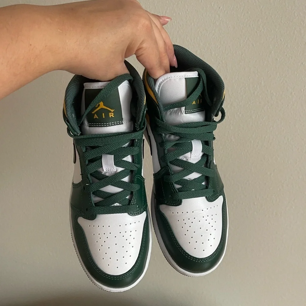 Nike sneakers featuring
